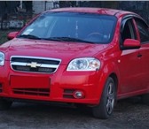 Chevrolet Aveo Отличное состояние Четырех дверный седан цвет - красный металлик, Обьем двигат 14695   фото в Димитровграде