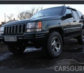 Продам внедорожник черного цвета Jeep Grand Cherokee 5, 2, машина была выпущена в 1996 году, пробе 9940   фото в Иркутске